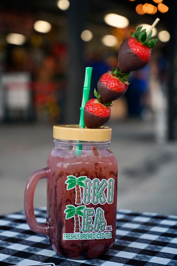 Tiki Tea's Fresh Brewed Sweetened Chocolate Strawberry Flavored iced tea is appearing for the first time at the 2024 Maryland State Fair. (Kenneth K. Lam/Staff)