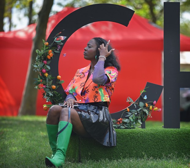 Kay Pringle, of Baltimore, wears an outfit that's for sale at her own boutque to the third CHICNIC A Charm City Picnic at Canton Waterfront Park. (Kenneth K. Lam/Staff)
