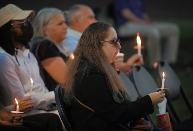 CCBC-Essex student Marina Deka holds a candle during a vigil for her friend Andrea Rodriguez Avila, who died in the Rice University shooting. Rodriguez Avila attended CCBC-Essex before transferring to Rice University. (Kenneth K. Lam/Staff)