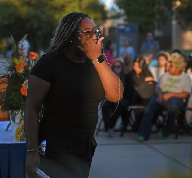 CCBC-Essex student Evita Nwachukwu wipes away tear during vigil for former student Andrea Rodriguez Avila, who was killed in the Rice University shooting. Andrea Rodriguez Avila was the first student Nwachukwu met on CCBC-Essex campus in 2022 and they became good friends. (Kenneth K. Lam/Staff)