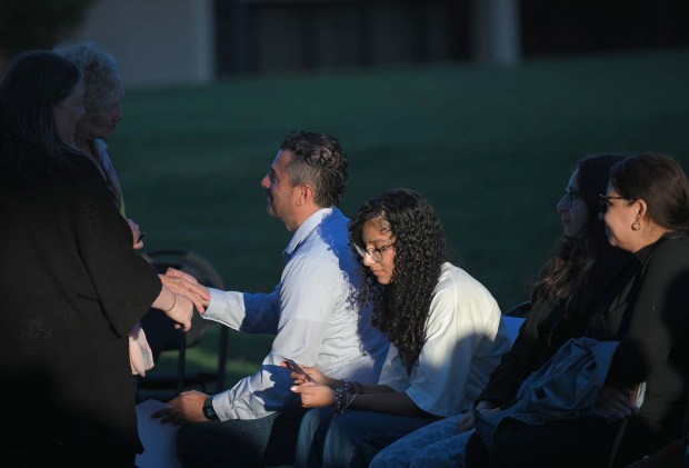 Students, staff and some family members, including her uncle, Manuel Albornoz, gather for vigil at CCBC-Essex for Andrea Rodriguez Avila, who died in the Rice University shooting. (Kenneth K. Lam/staff)