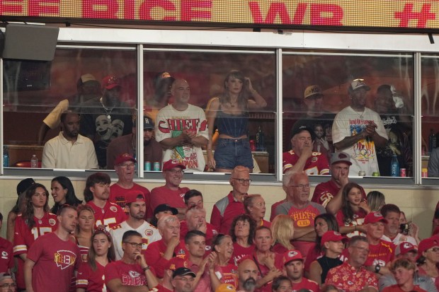 Taylor Swift is seen in a suite during the first half of an NFL football game between the Kansas City Chiefs and the Baltimore Ravens Thursday, Sept. 5, 2024, in Kansas City, Mo. (AP Photo/Charlie Riedel)