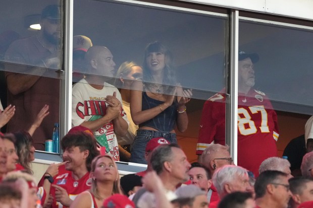 Taylor Swift is seen in a suite before the start of an NFL football game between the Kansas City Chiefs and the Baltimore Ravens Thursday, Sept. 5, 2024, in Kansas City, Mo. (AP Photo/Ed Zurga)